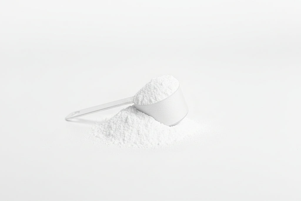 White boot with glitter on a light gray background