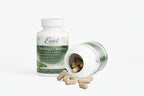 Moringa Oleifera supplement bottle with open lid showing capsules on a white background