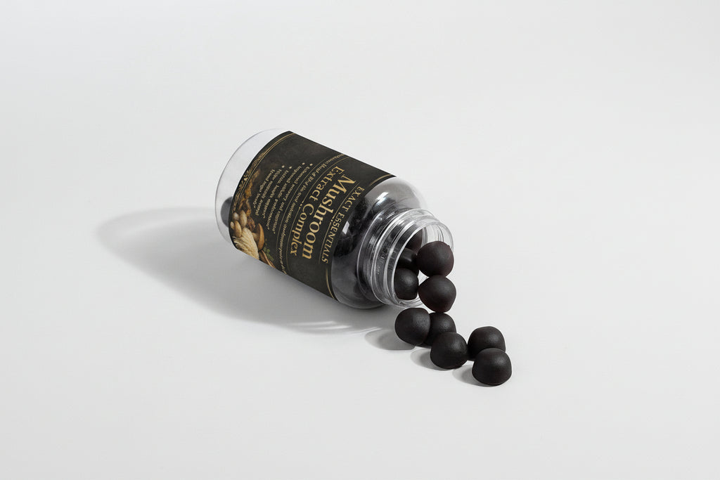 Black capsules spilling out of a transparent container with a black label on a light gray background.