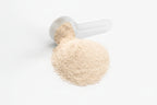 Beige powder spilling out of a small container on a white background with 'suplifull' branding.