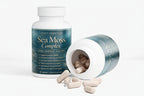 Sea Moss Complex supplement bottle with open lid showing capsules on a white background